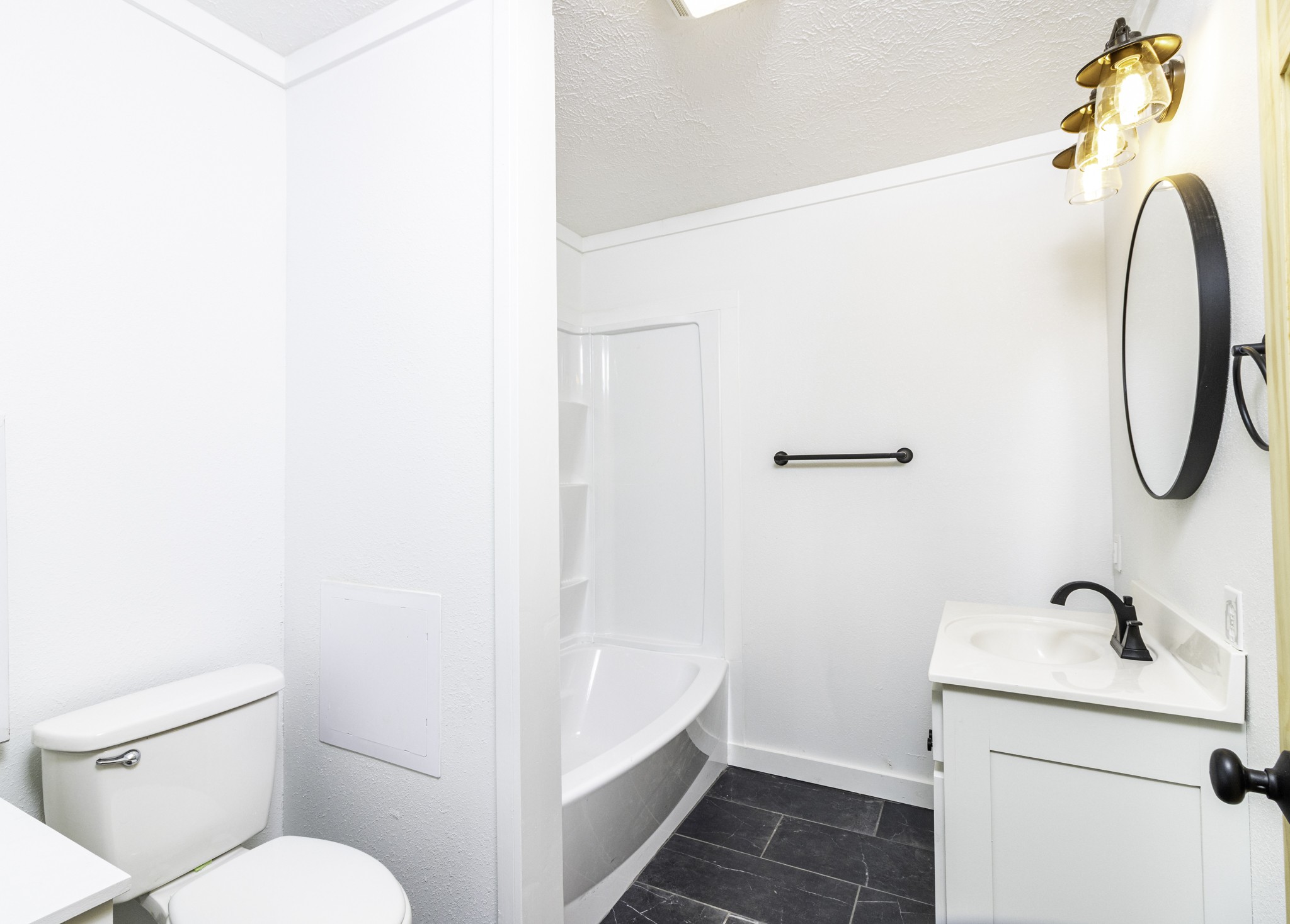 405 Napier Lake Road Hohenwald, TN 38462 - Photo 22 of 26 a bathroom with a sink and a mirror