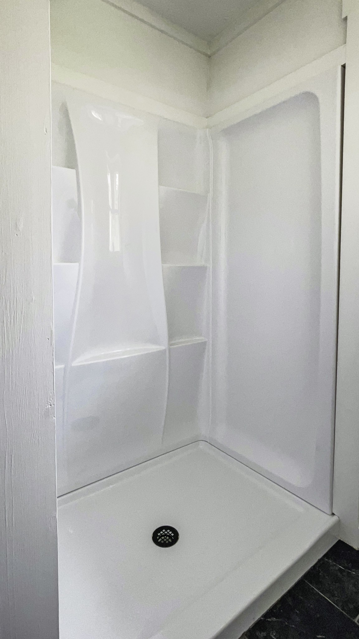 405 Napier Lake Road Hohenwald, TN 38462 - Photo 24 of 26 a bathroom with a shower