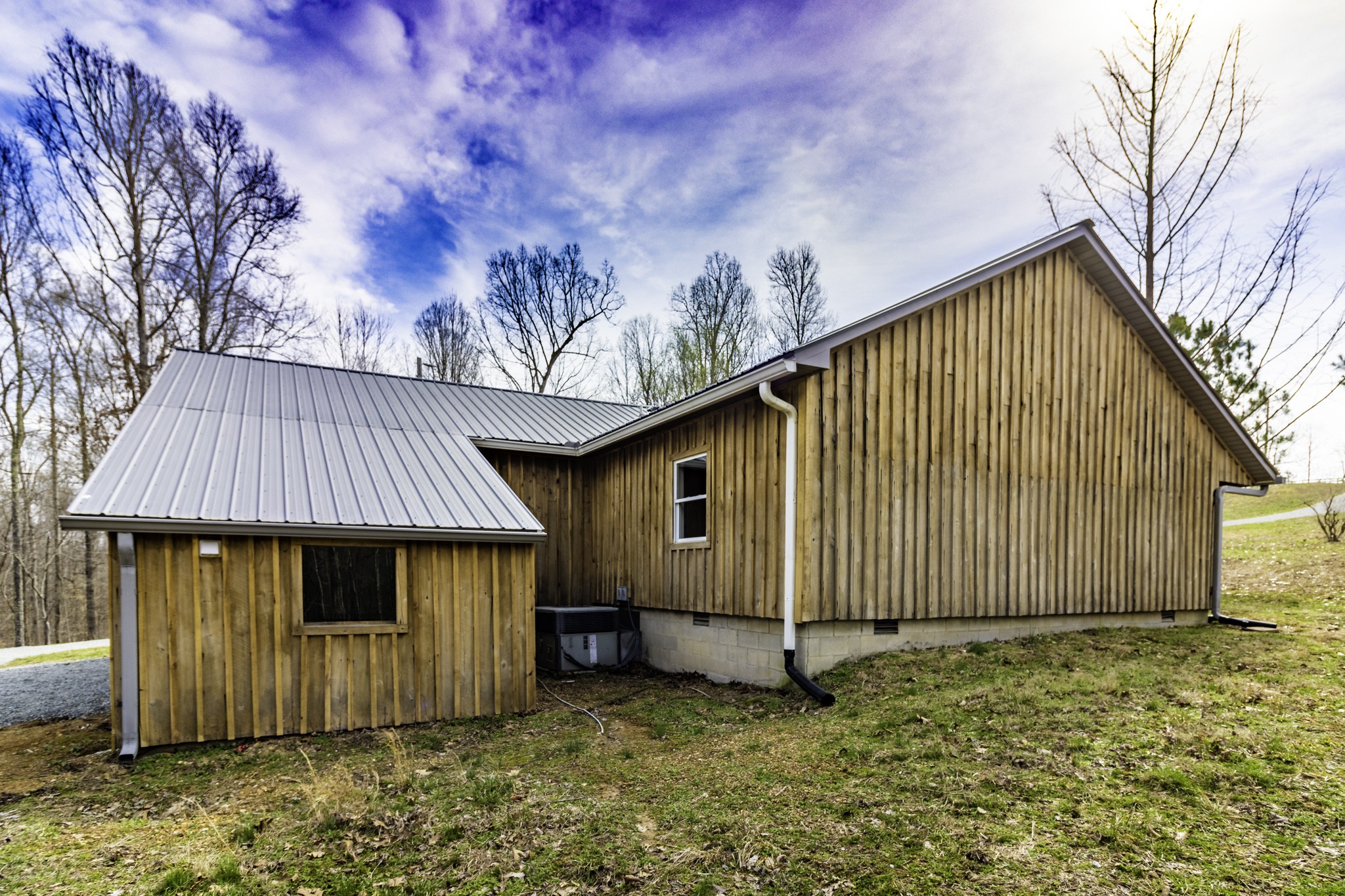 405 Napier Lake Road Hohenwald, TN 38462 - Photo 7 of 26 a backyard of a house