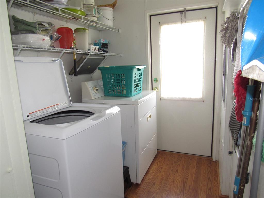 10101 Burnt Store Road, Unit 52 Punta Gorda, FL 33950 - Photo 21 of 37 a room with storage and utility