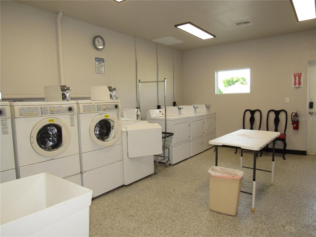 10101 Burnt Store Road, Unit 52 Punta Gorda, FL 33950 - Photo 27 of 37 a utility room with dryer and washer