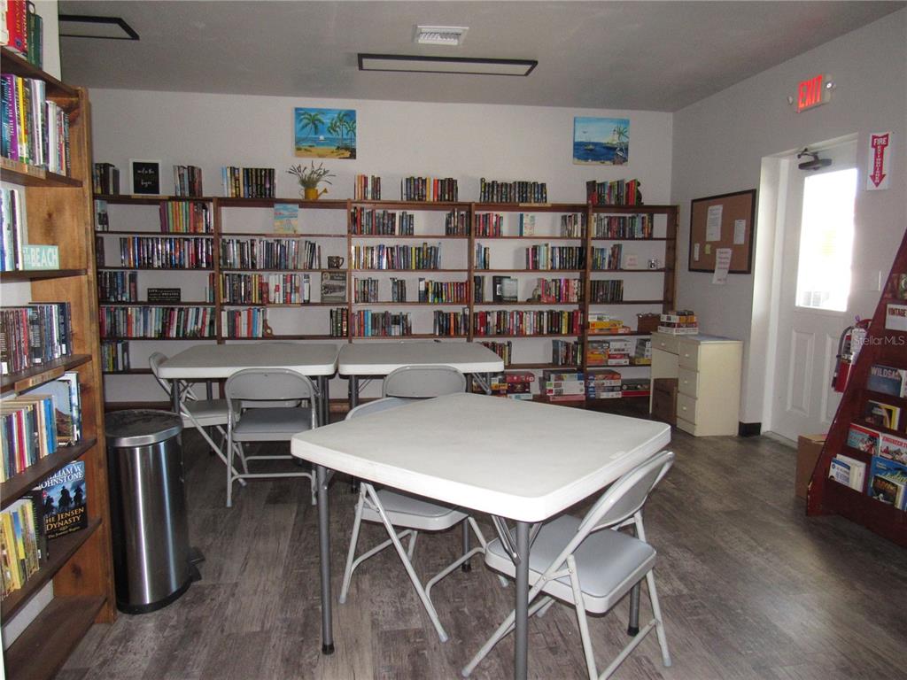 10101 Burnt Store Road, Unit 52 Punta Gorda, FL 33950 - Photo 30 of 37 a view of a workspace with furniture and toys