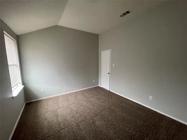 an empty room with a natural light