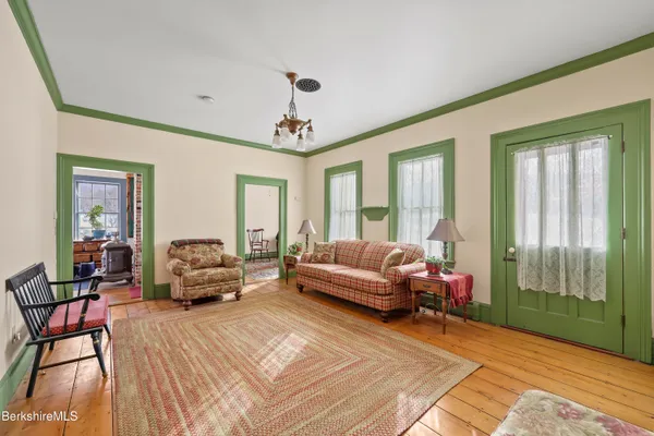 a dining room with a table and chairs
