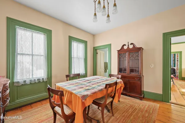 a bedroom with a bed and a table in it