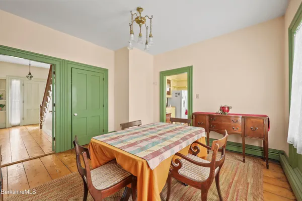 a kitchen with stainless steel appliances a stove top oven