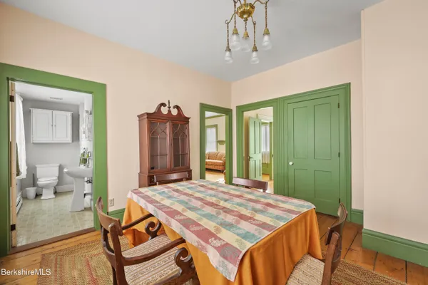 a kitchen with stove and cabinets