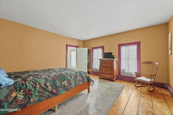 a view of room with window and entryway