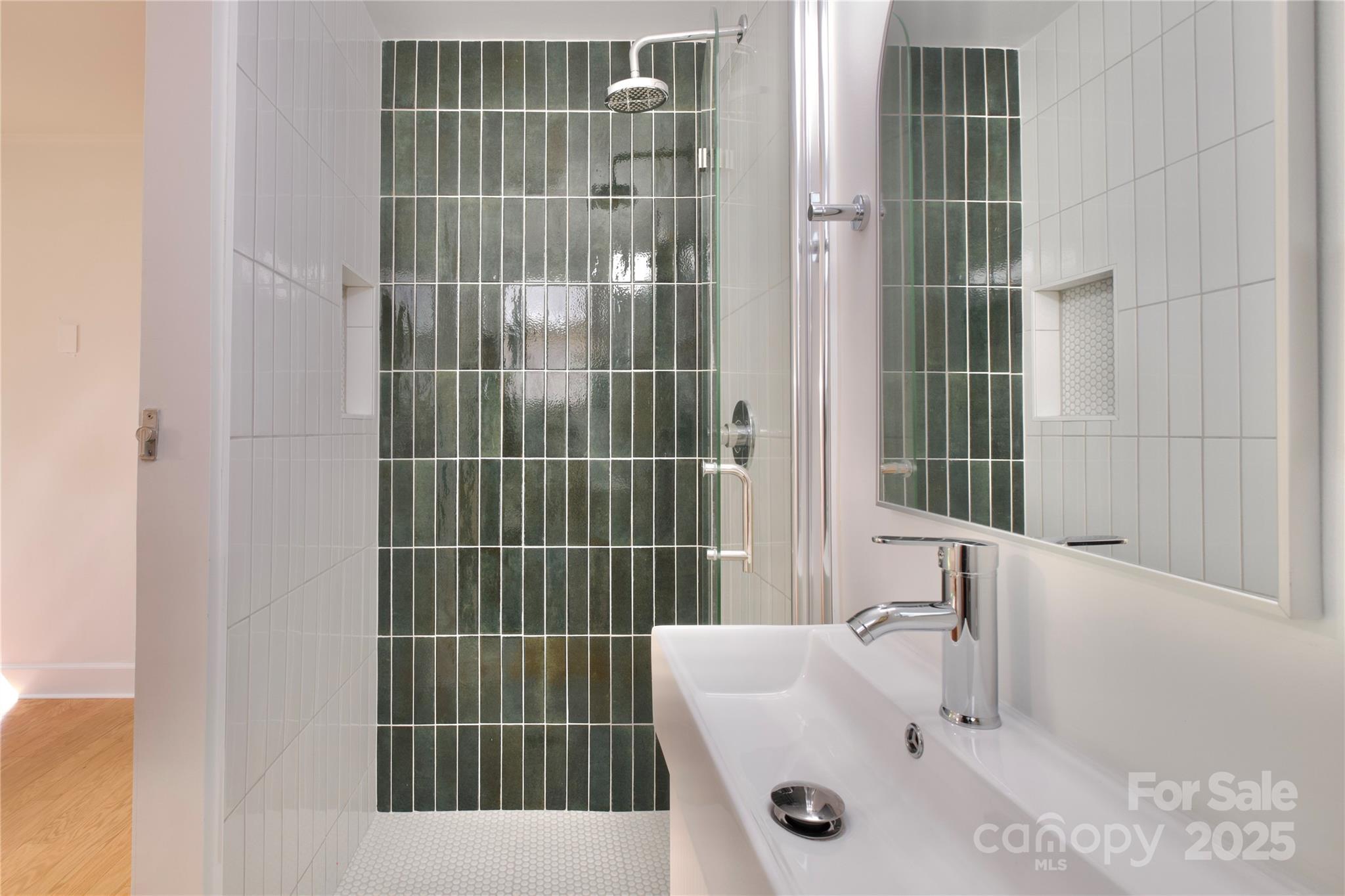 3549 Woodleaf Road Charlotte, NC 28205 - Photo 35 of 43 a bathroom with a tub and a sink
