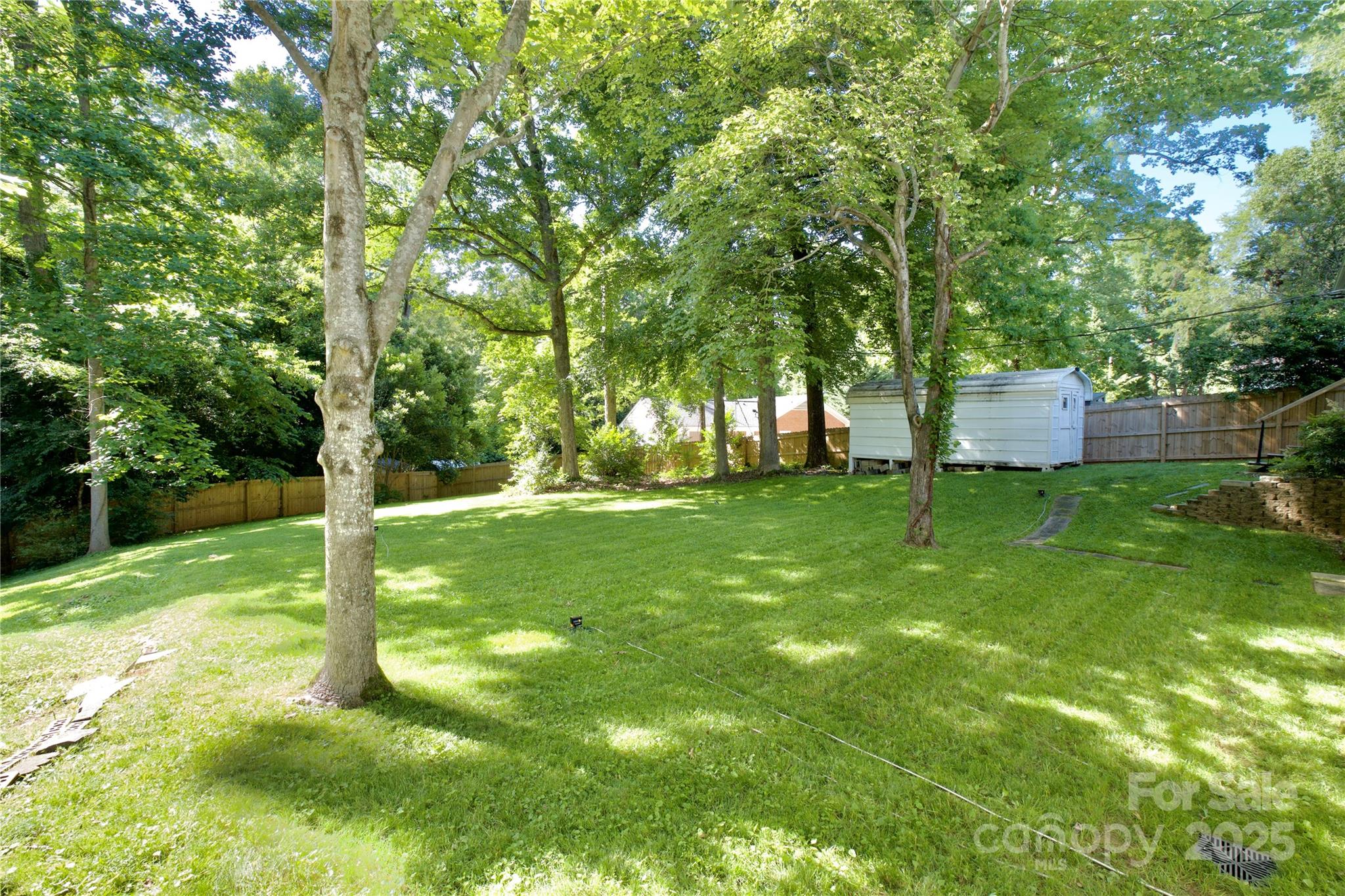 3549 Woodleaf Road Charlotte, NC 28205 - Photo 43 of 43 a view of a trees with a yard