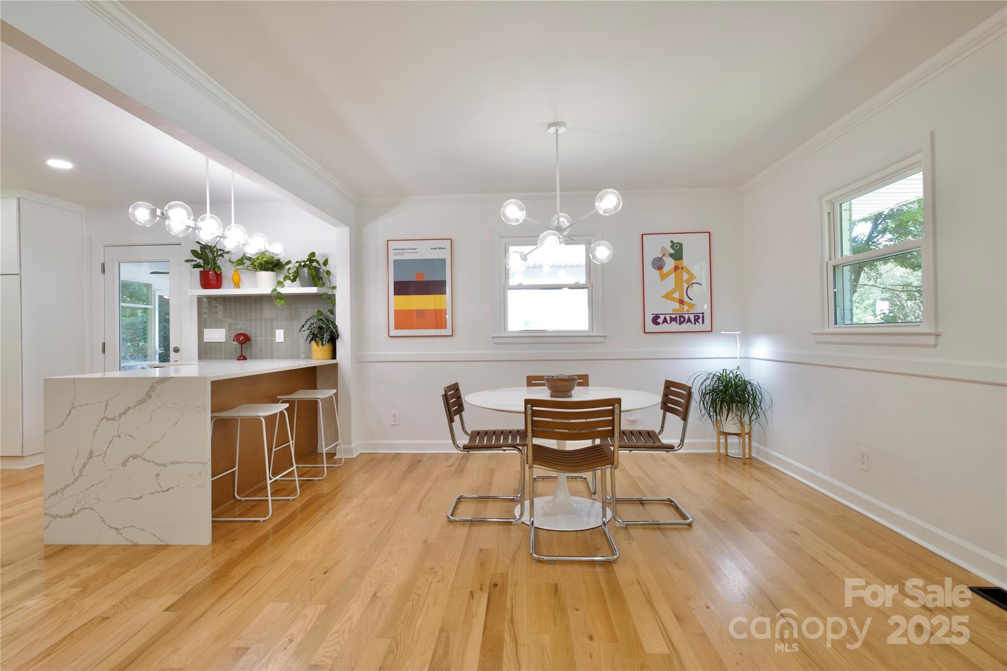 3549 Woodleaf Road Charlotte, NC 28205 - Photo 8 of 43 a living room with furniture and a wooden floor
