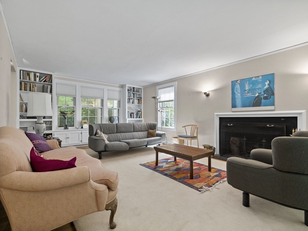 14 Birch Road Wellesley, MA 02482 - Photo 5 of 18 a living room with furniture and a fireplace