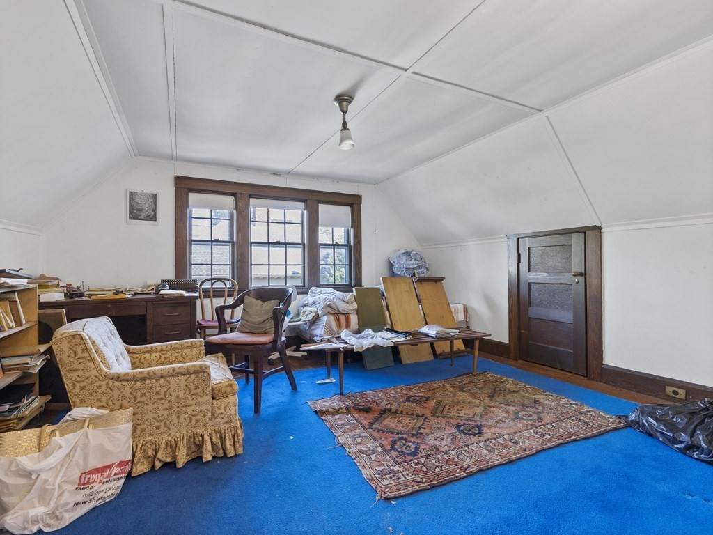 14 Birch Road Wellesley, MA 02482 - Photo 7 of 18 a living room with furniture rug and a window