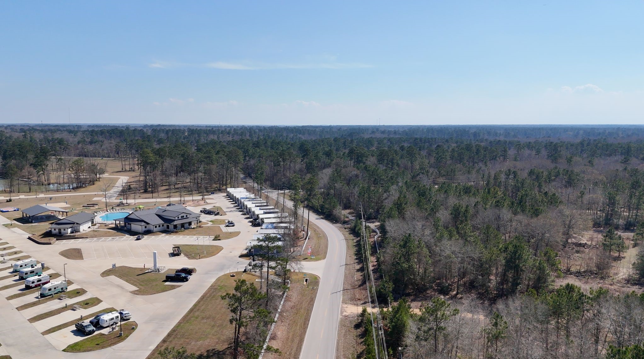 0 Cheatham Road Huffman, TX 77336 - Photo 11 of 11 Aerial view of Magnolia Point Drive, the entry access road to the community.