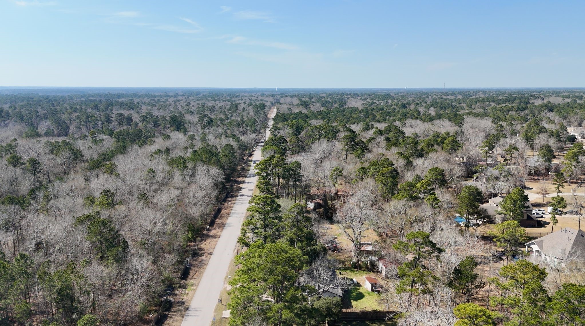 0 Cheatham Road Huffman, TX 77336 - Photo 10 of 11 Aerial view of Magnolia Point Drive, the entry access road to the community.