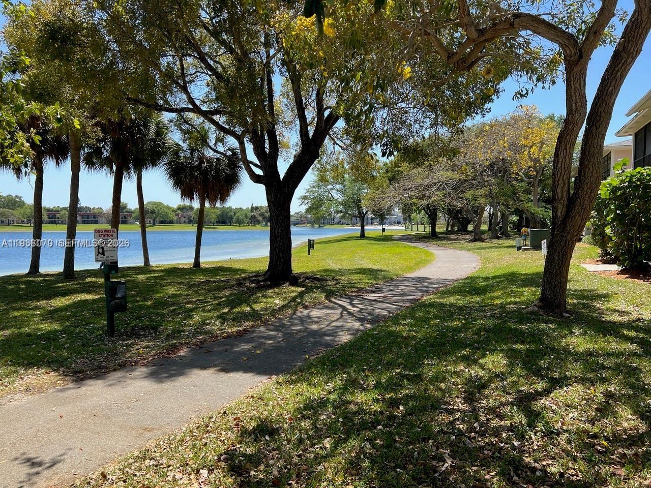 9727 Hammocks Boulevard, Unit 202D Miami, FL 33196 - Photo 16 of 16 a view of swimming pool with a backyard