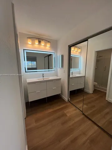 a view of living room with furniture and flat screen tv