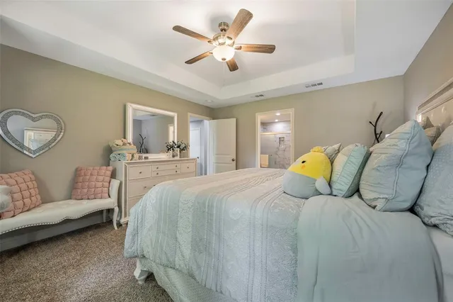 a bed room with a bed and furniture