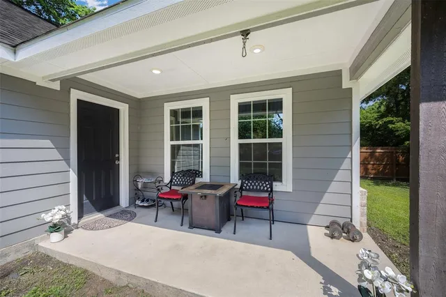 a building outdoor space with patio furniture