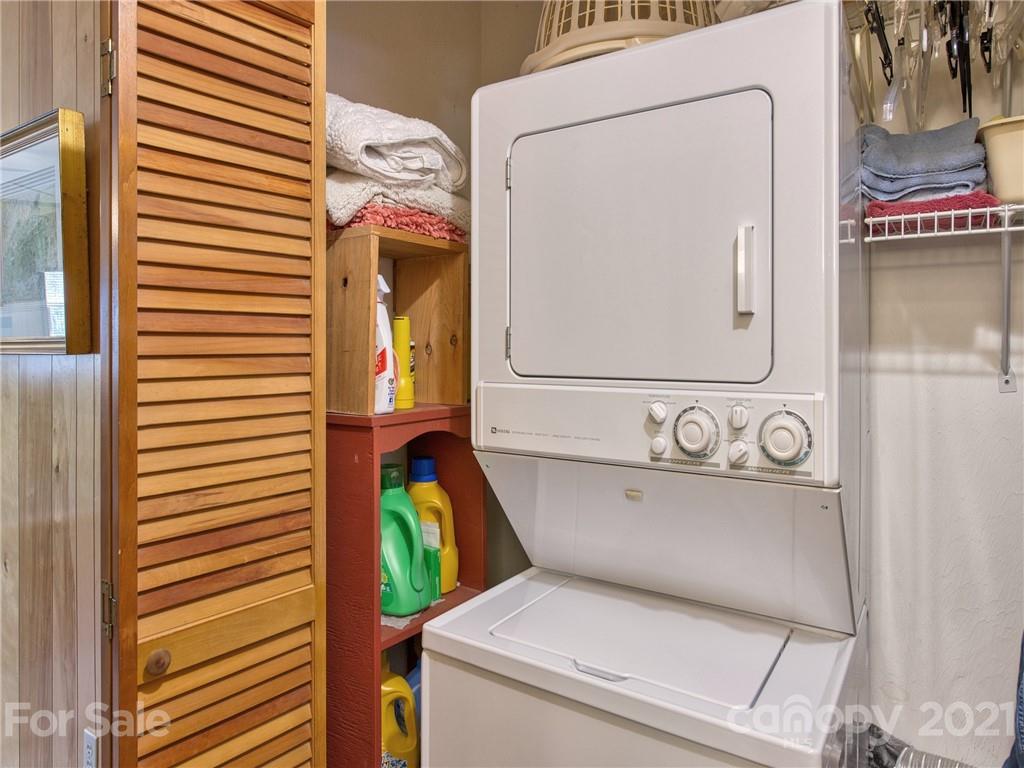 444 Stoney Ridge Loop Maggie Valley, NC 28751 - Photo 20 of 25 a utility room with a washer and dryer
