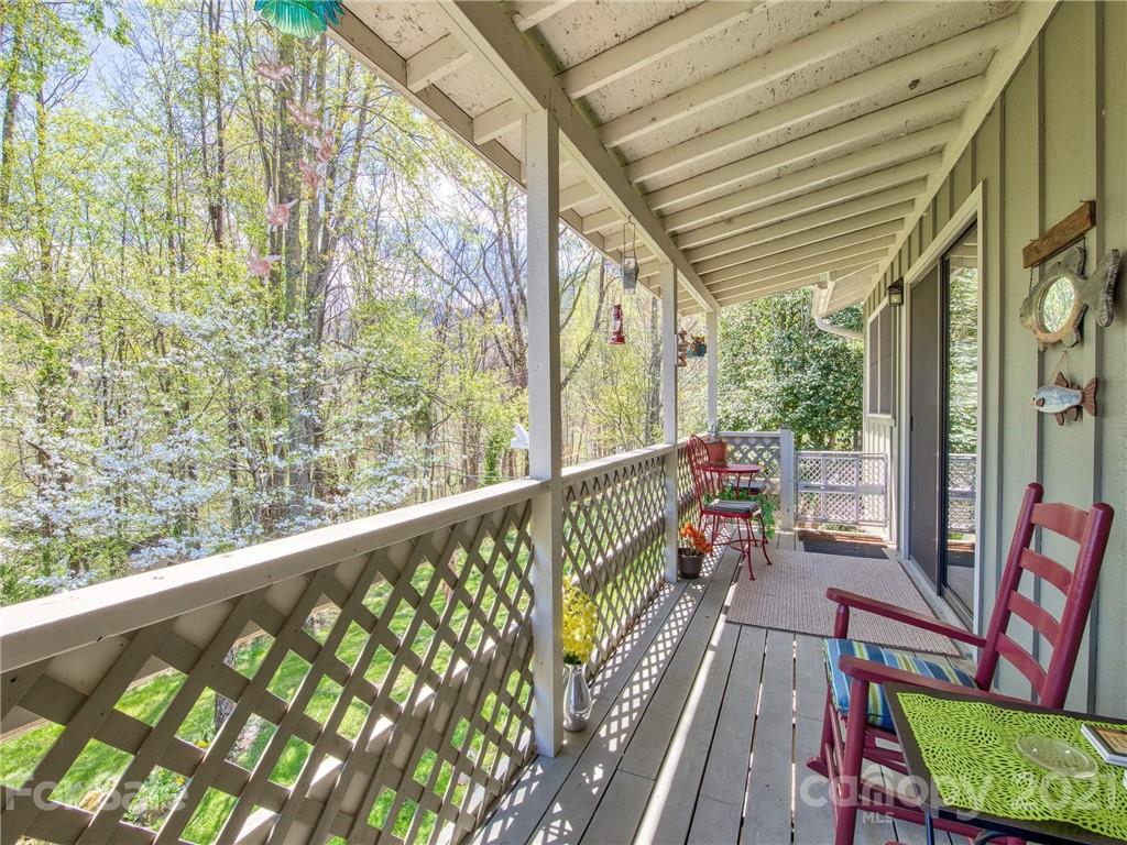 444 Stoney Ridge Loop Maggie Valley, NC 28751 - Photo 23 of 25 a view of a two chairs in the balcony