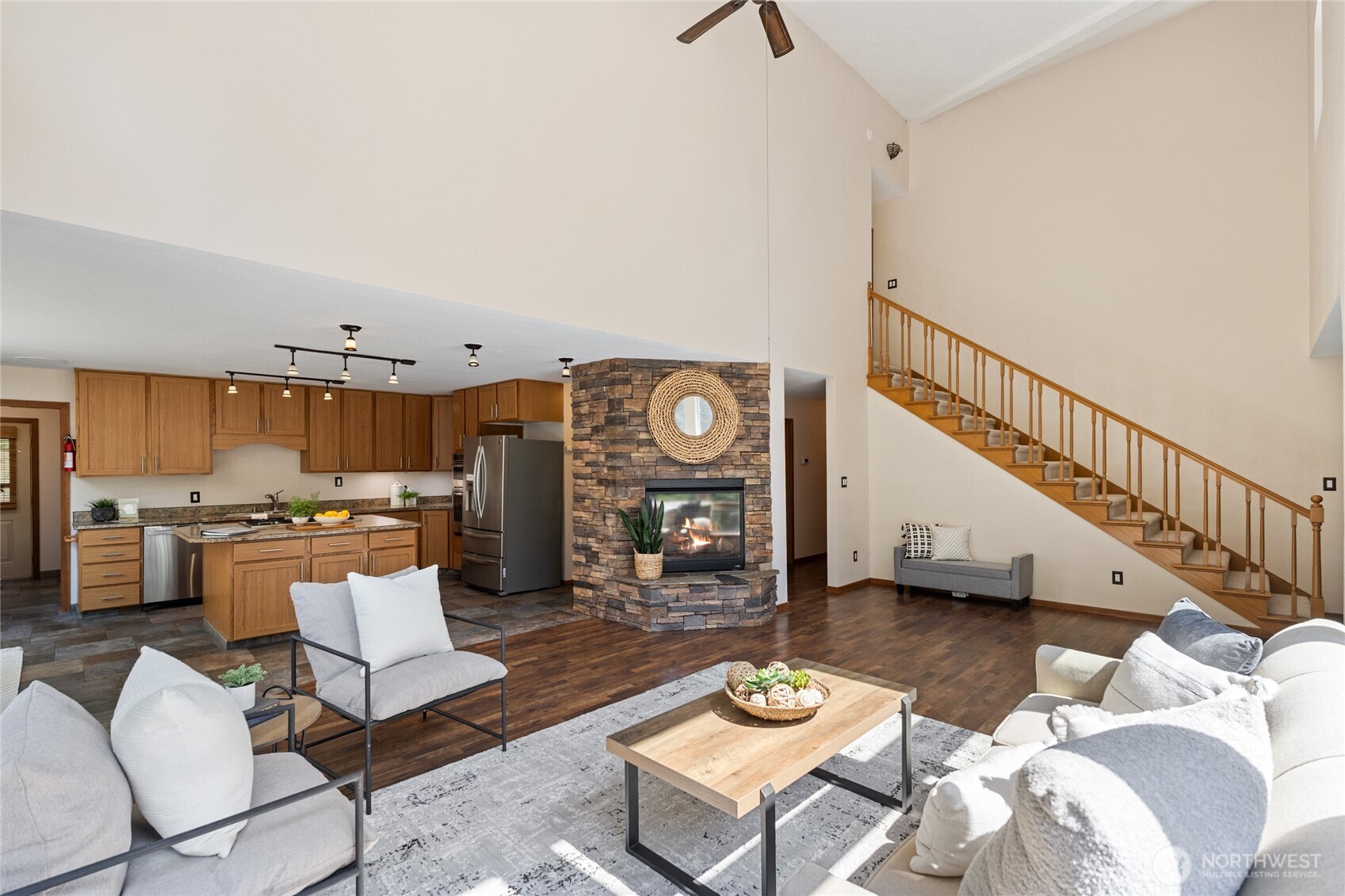 20 Bluebird Lane Port Ludlow, WA 98365 - Photo 11 of 40 a living room with lots of furniture and view of kitchen