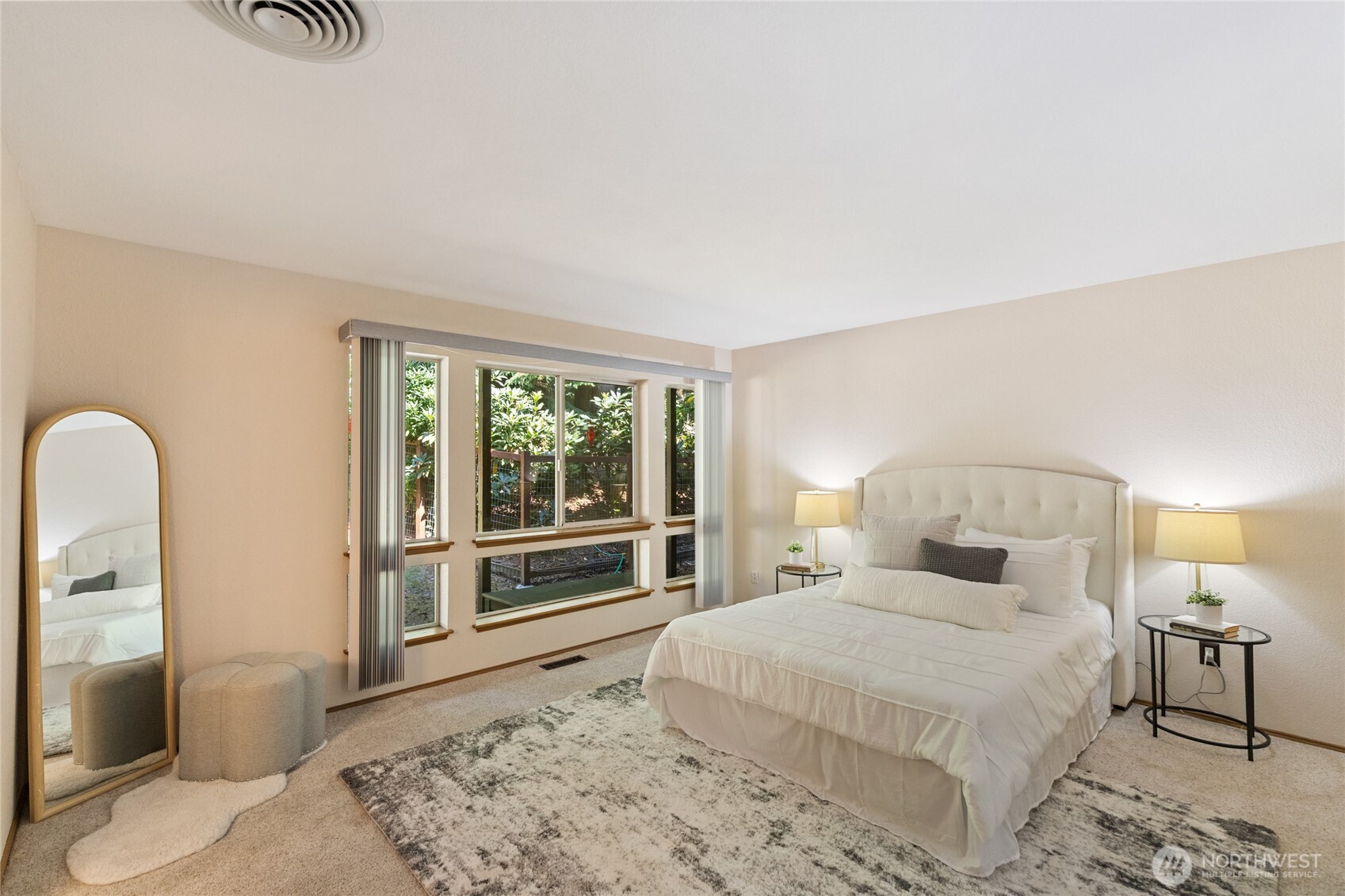 20 Bluebird Lane Port Ludlow, WA 98365 - Photo 20 of 40 a bedroom with a bed and a large window