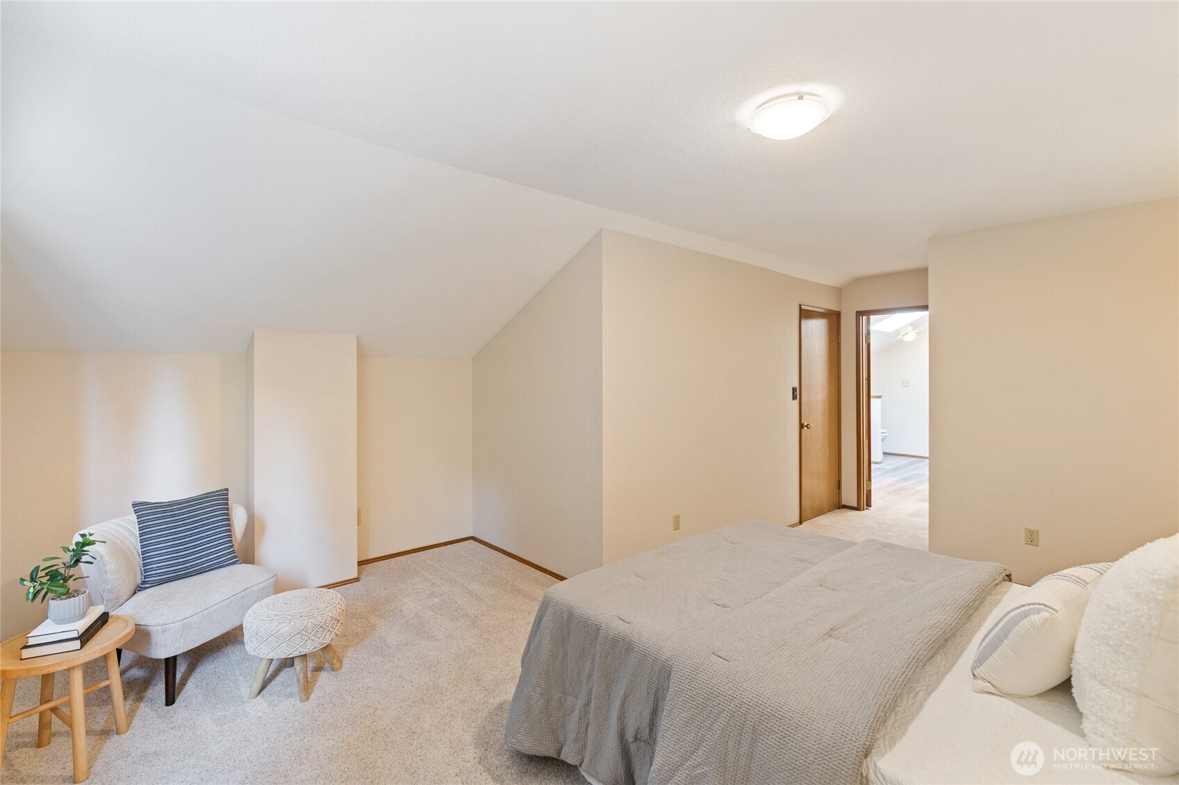 20 Bluebird Lane Port Ludlow, WA 98365 - Photo 27 of 40 a bedroom with a bed and chair