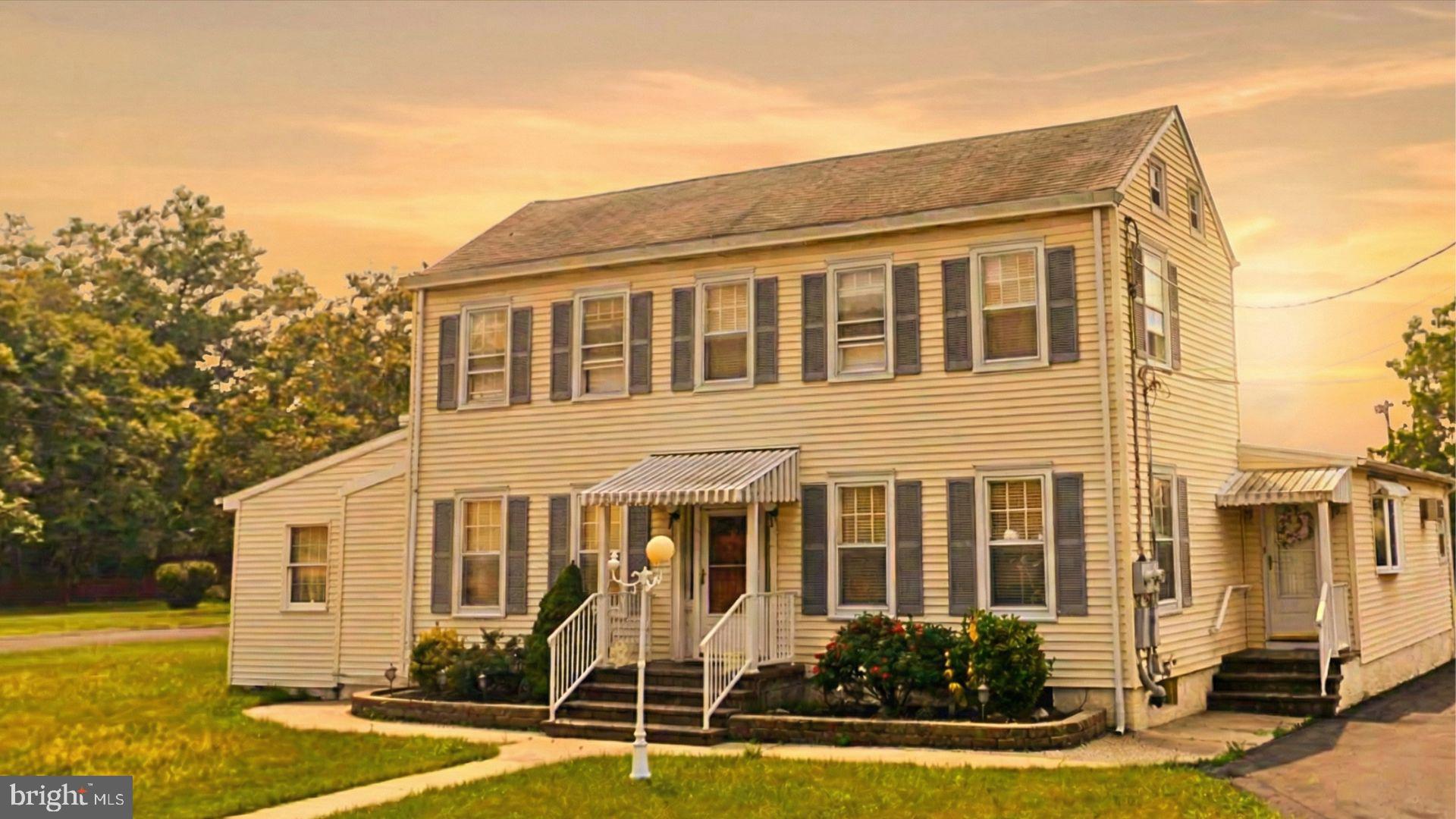 163 Klockner Road Trenton, NJ 08619 - Photo 1 of 8 a front view of a house with swimming pool and porch