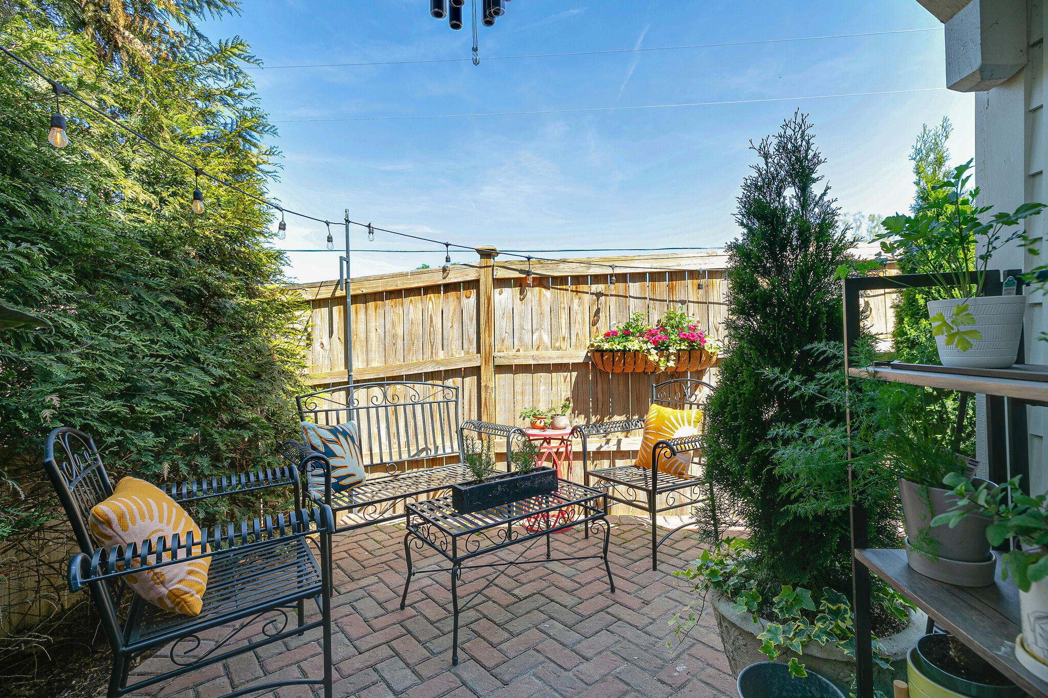 104 Cottage Lane Franklin, TN 37064 - Photo 15 of 19 a balcony with chairs and with potted plants