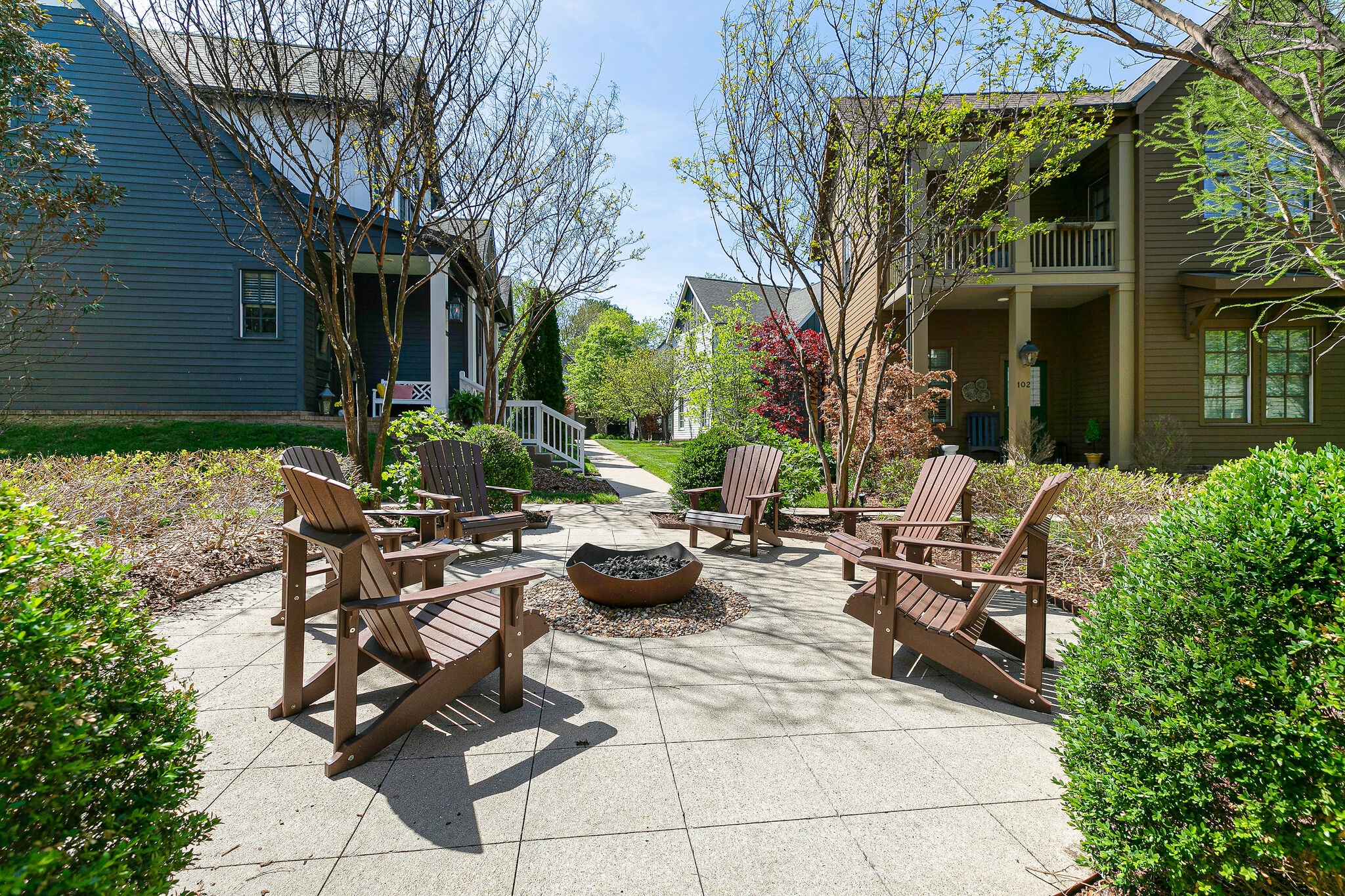 104 Cottage Lane Franklin, TN 37064 - Photo 18 of 19 a view of a patio with couches table and chairs and potted plants