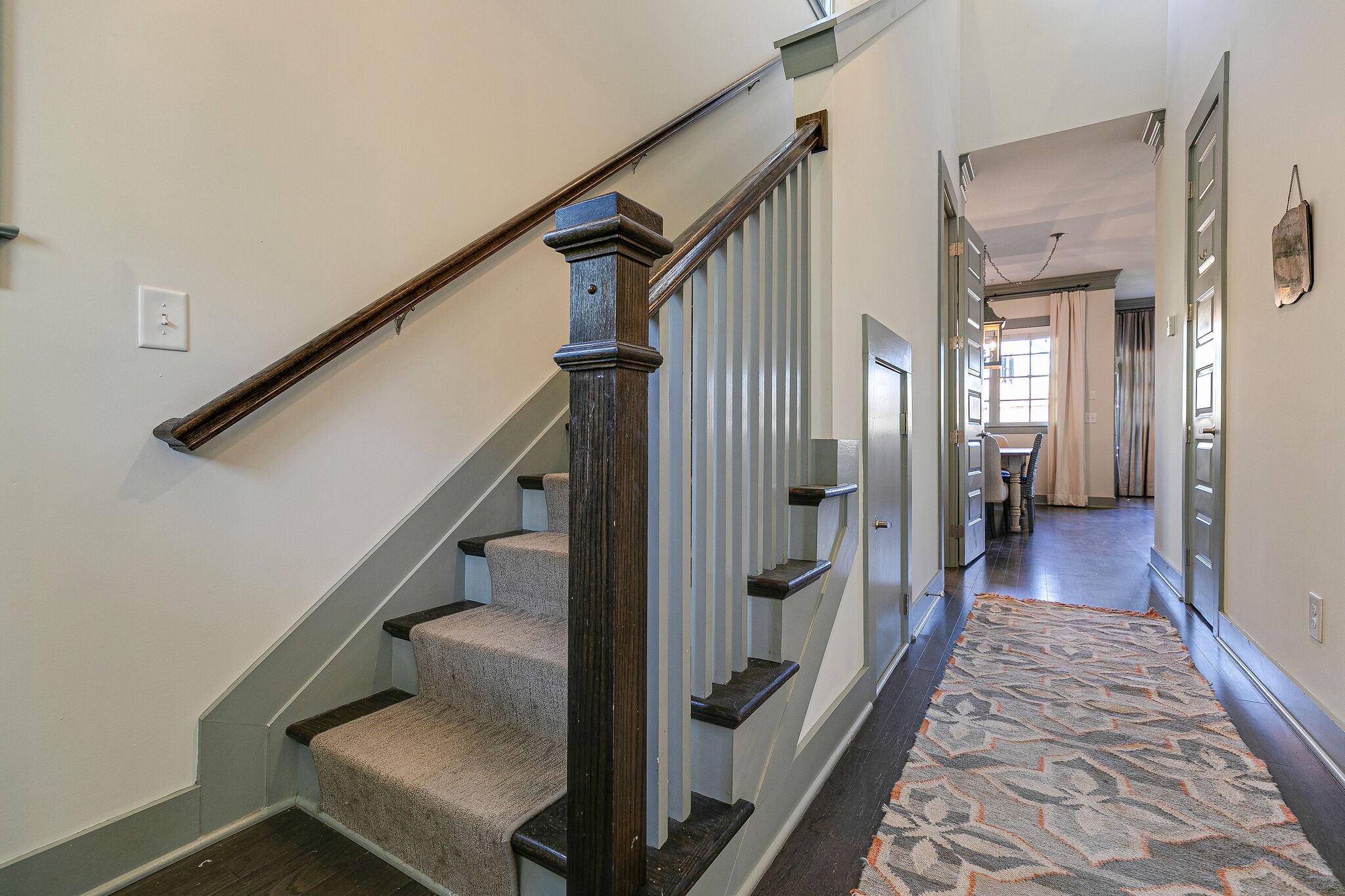104 Cottage Lane Franklin, TN 37064 - Photo 3 of 19 a view of a hallway with wooden floor and staircase