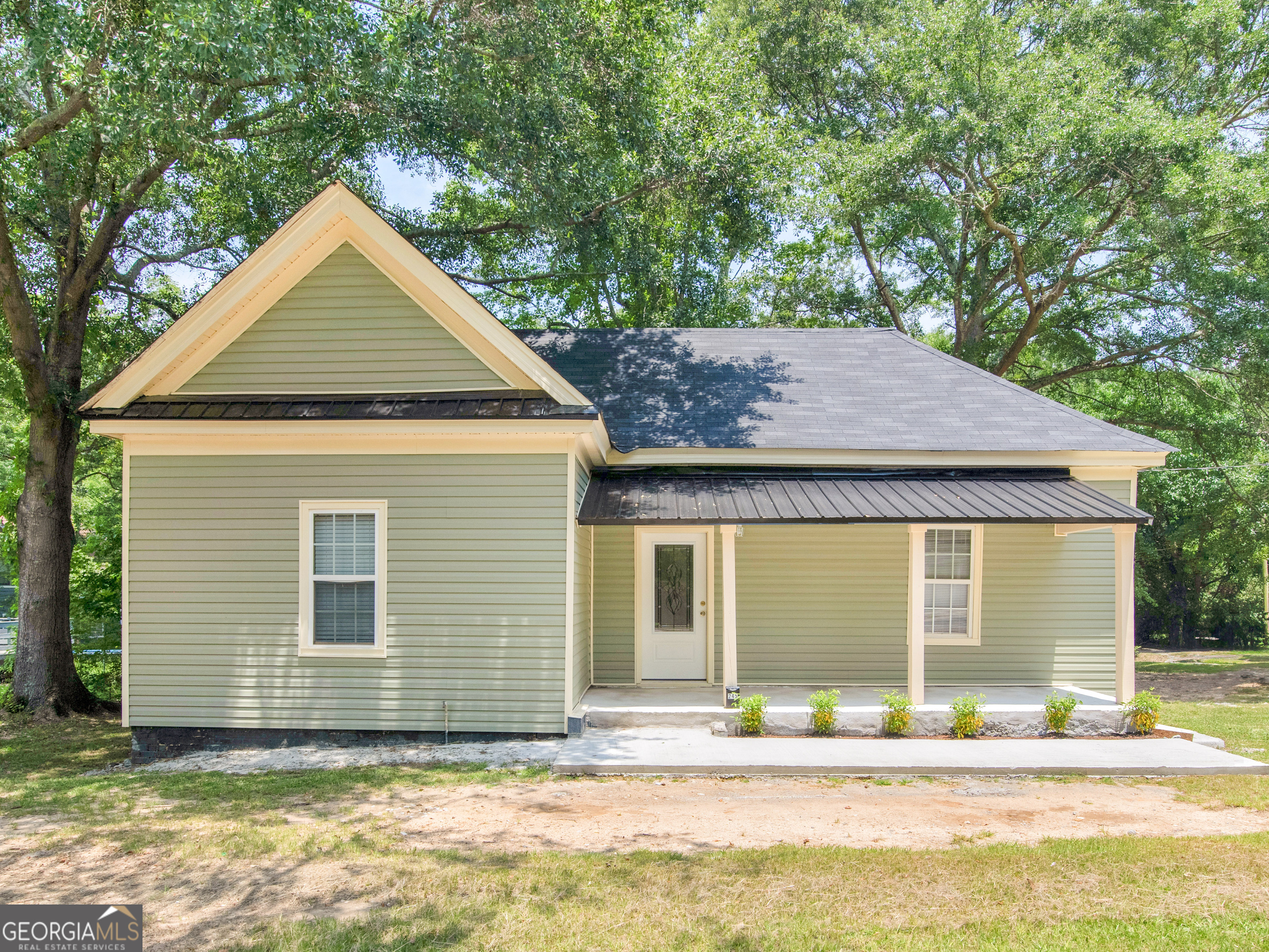 245 Atlanta Street Barnesville, GA 30204 - Photo 1 of 36 a house with a outdoor space