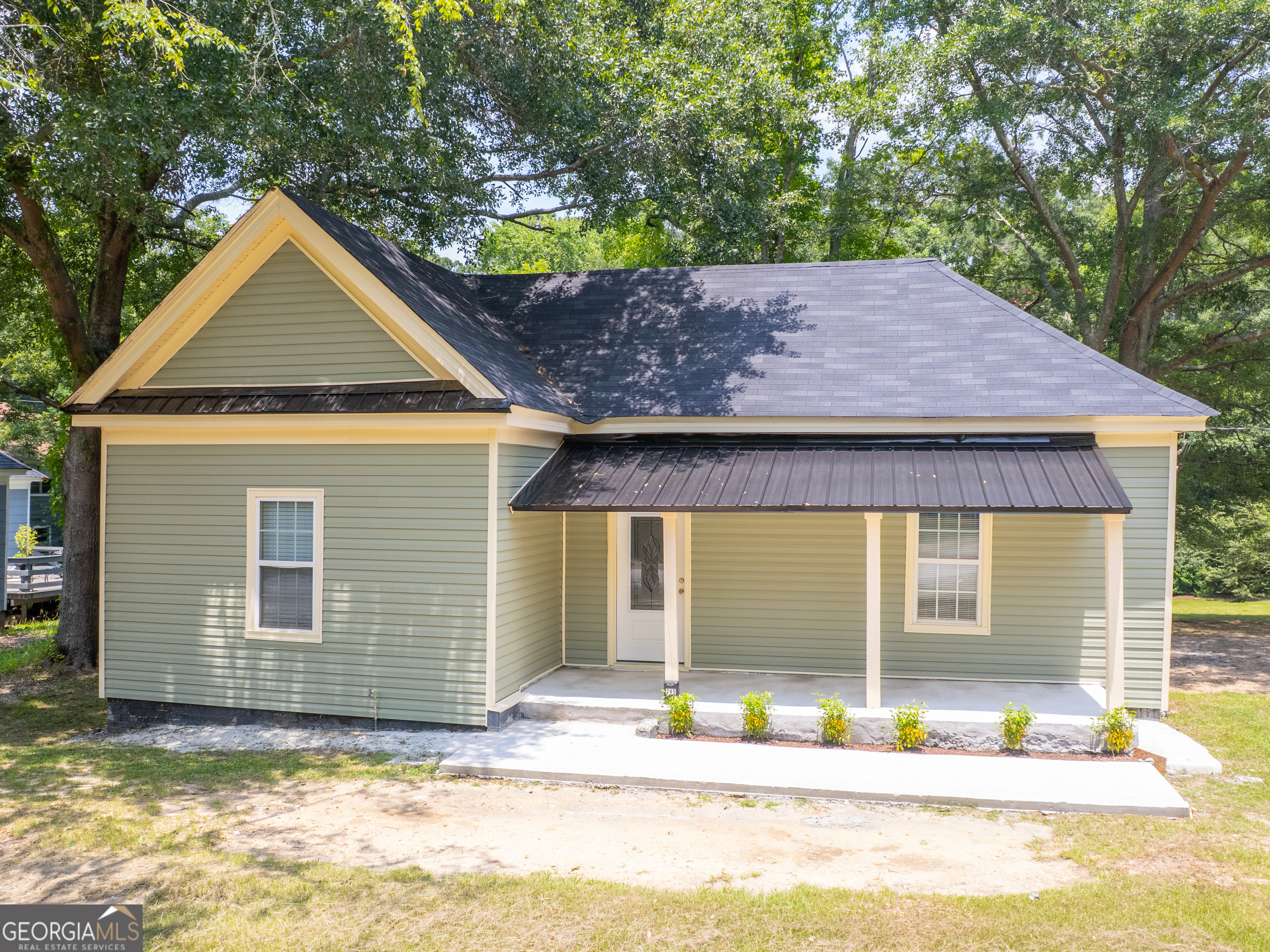 245 Atlanta Street Barnesville, GA 30204 - Photo 33 of 36 a house view with a outdoor space