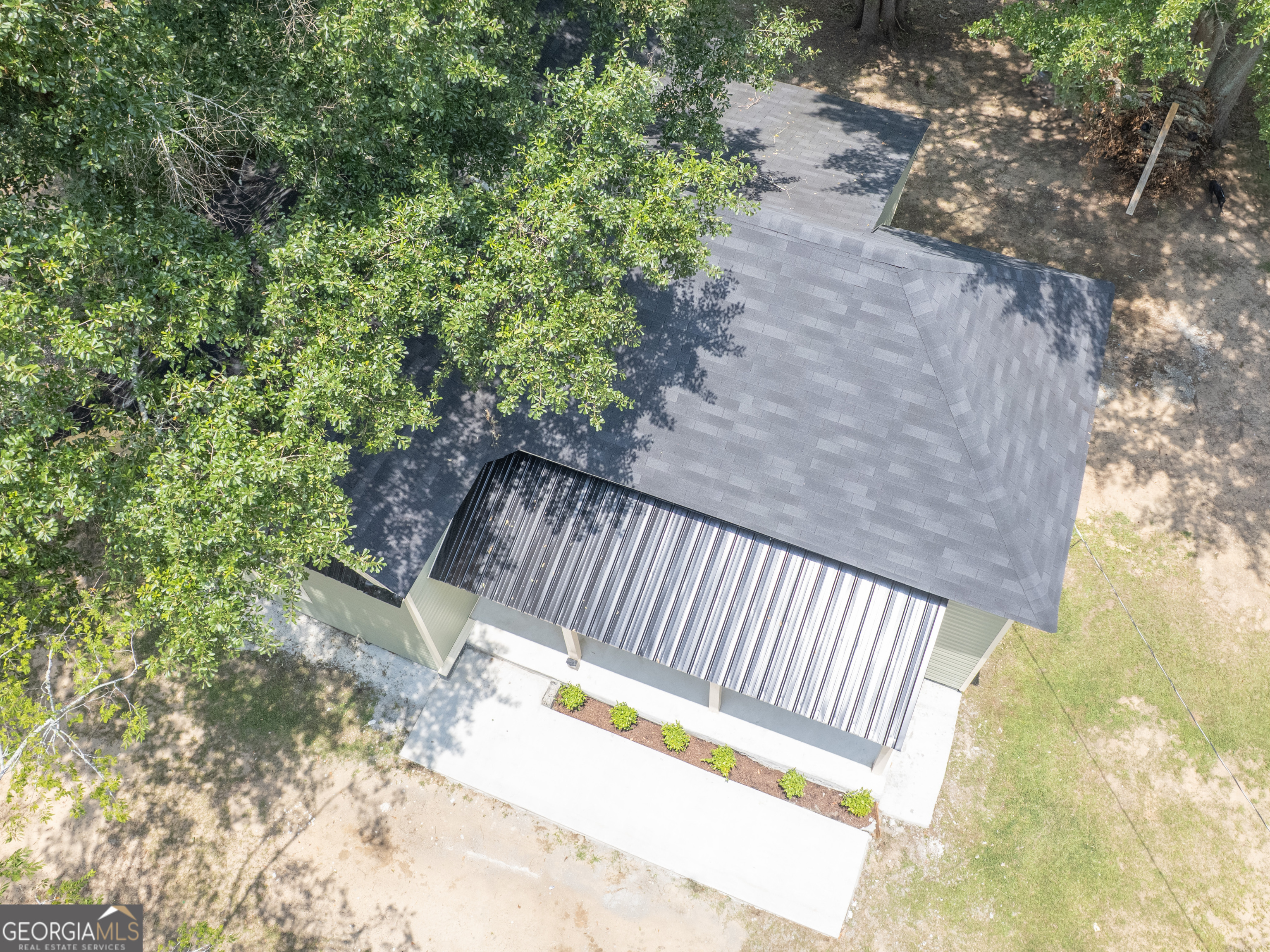 245 Atlanta Street Barnesville, GA 30204 - Photo 34 of 36 a view of balcony with wooden floor