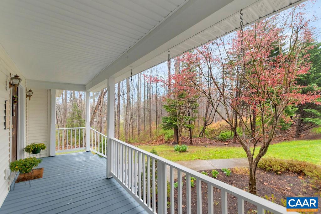 1011 Rippin Run Road Ruckersville, VA 22968 - Photo 7 of 38 a view of balcony with wooden floor and outdoor space