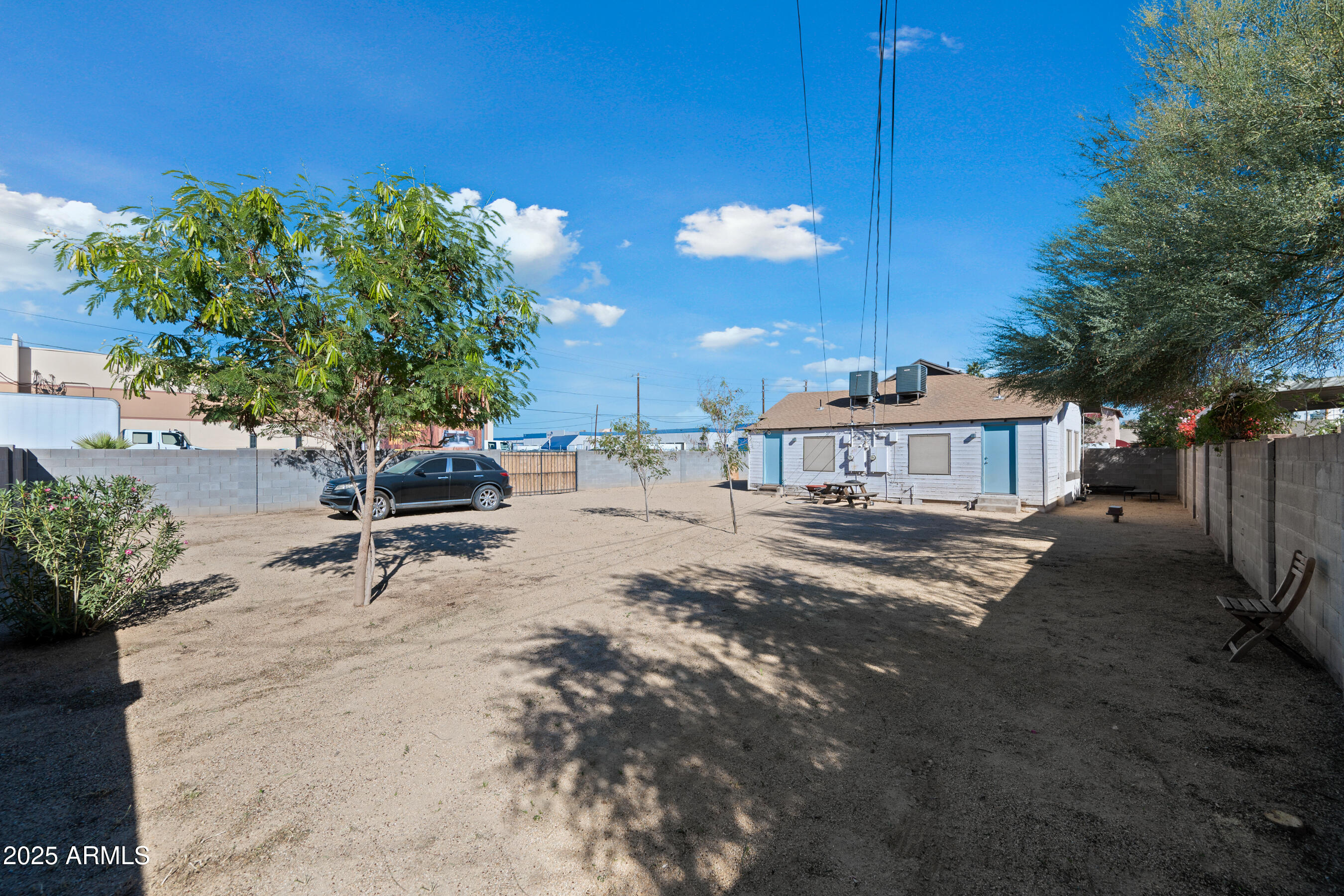 438 North 17th Avenue, Unit A Phoenix, AZ 85007 - Photo 20 of 20 a view of a house with backyard and sitting area