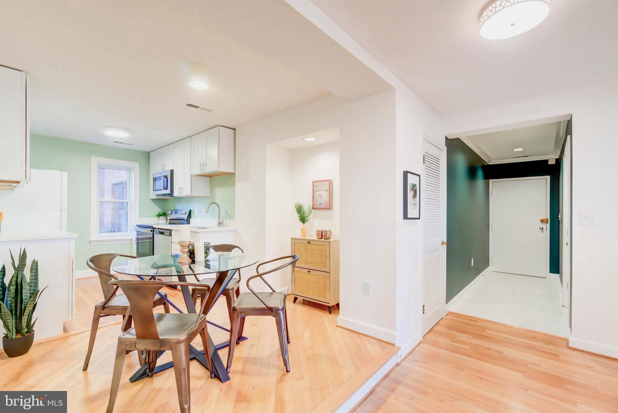 1724 17th Street Northwest, Unit 71 Washington, DC 20009 - Photo 10 of 23 a view of a dining room with furniture and wooden floor