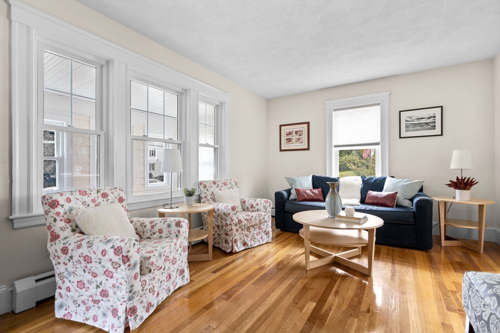 77 Grandview Road Arlington, MA 02476 - Photo 3 of 42 a living room with furniture and wooden floor