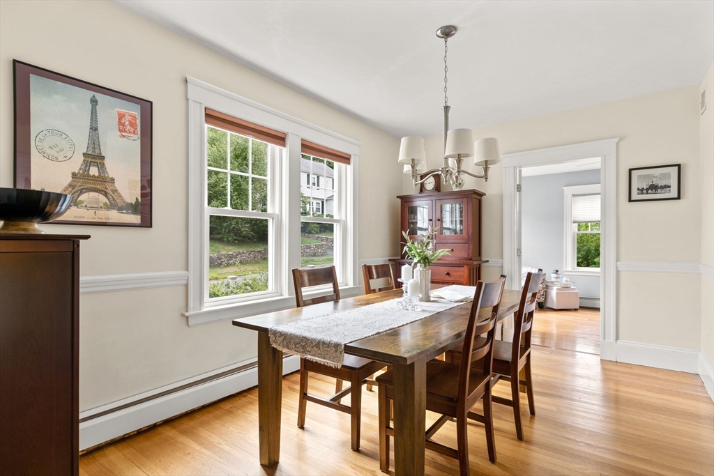 77 Grandview Road Arlington, MA 02476 - Photo 8 of 42 a view of a dining room with furniture window and wooden floor