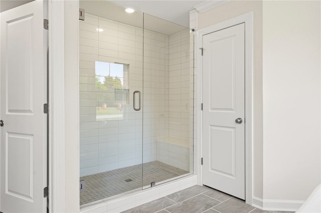 1108 Manse Jolly Road Anderson, SC 29621 - Photo 28 of 45 This sleek bathroom features a spacious glass-enclosed shower.