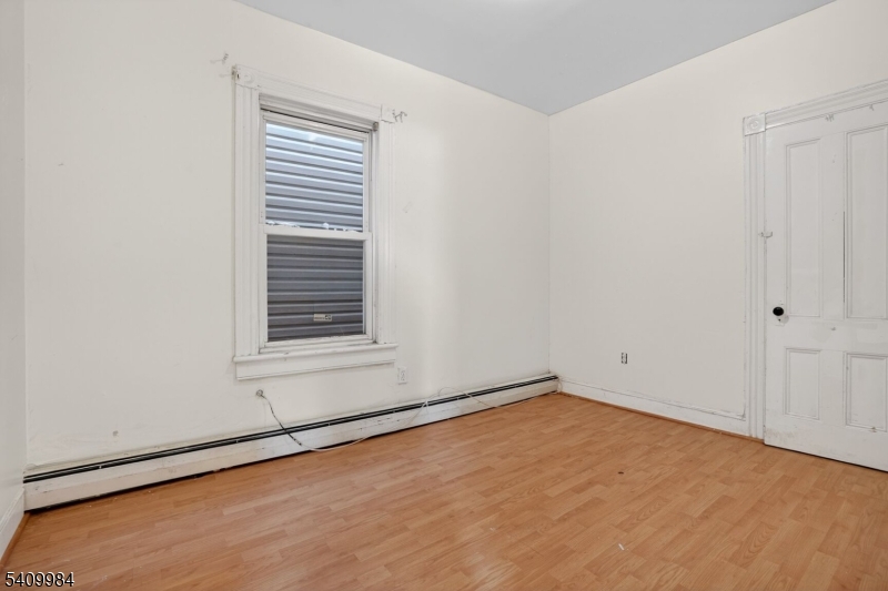 1110 Hampton Place Elizabeth, NJ 07201 - Photo 11 of 23 a view of an empty room with a window