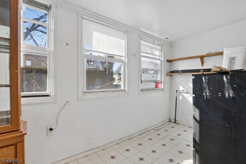 1110 Hampton Place Elizabeth, NJ 07201 - Photo 21 of 23 a walk in closet with window in it