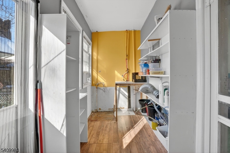 1110 Hampton Place Elizabeth, NJ 07201 - Photo 22 of 23 a view of living room with furniture and a floor to ceiling window