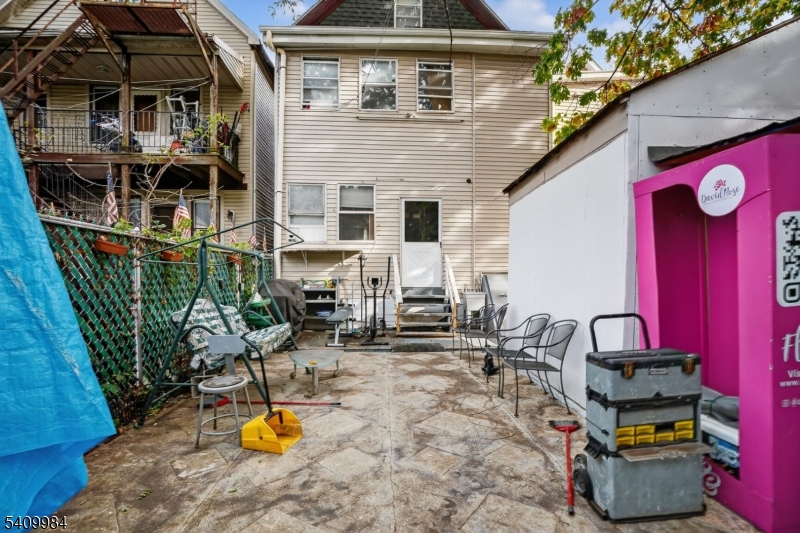 1110 Hampton Place Elizabeth, NJ 07201 - Photo 23 of 23 a view of a chairs and table in the patio