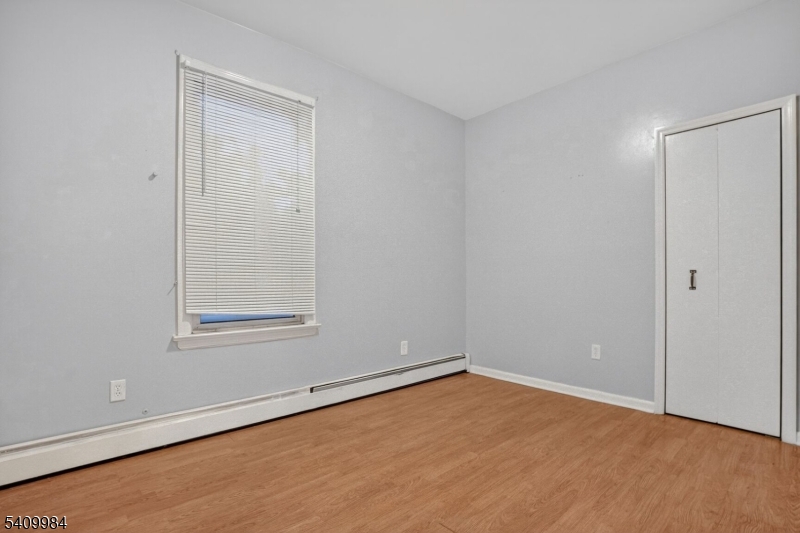 1110 Hampton Place Elizabeth, NJ 07201 - Photo 5 of 23 a view of an empty room with a window