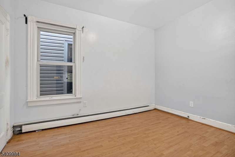 1110 Hampton Place Elizabeth, NJ 07201 - Photo 10 of 23 a view of an empty room with a window