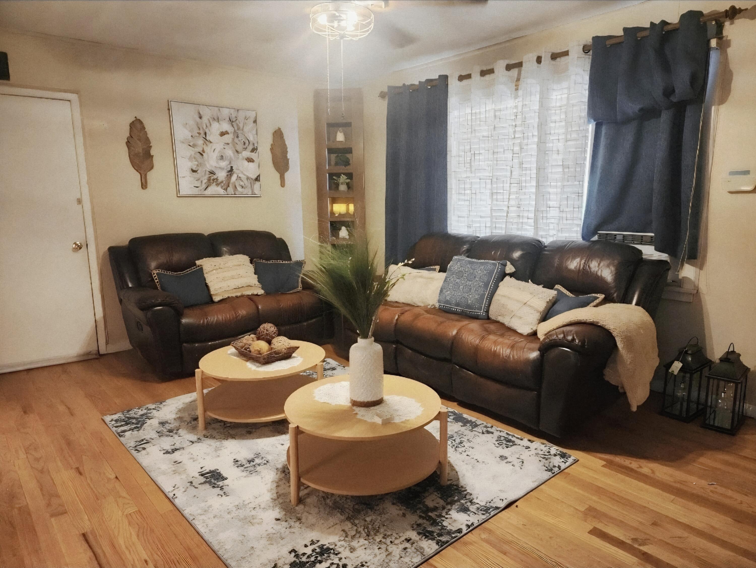 3317 Harvard Street Lubbock, TX 79415 - Photo 2 of 2 a living room with furniture and a large window