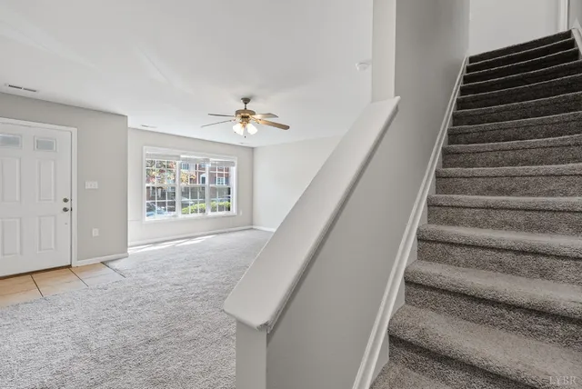 a view of an entryway with stairs