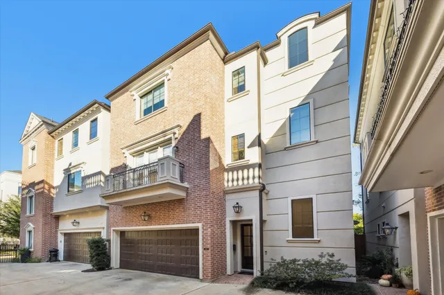 a view of a blue building with many windows